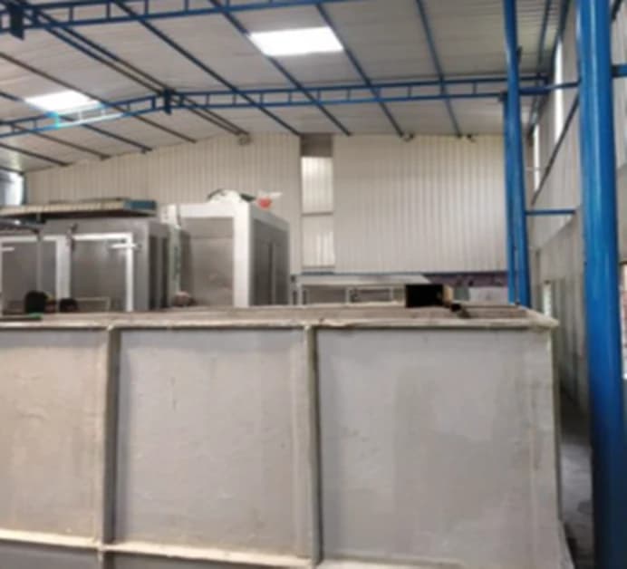 Fabrication bay with sheet metal assemblies in progress